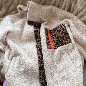 Amazon Cream Teddy Jacket with Leopard Print and Orange Accents